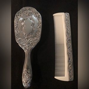 Vintage silver plated embossed brush and comb vanity set.